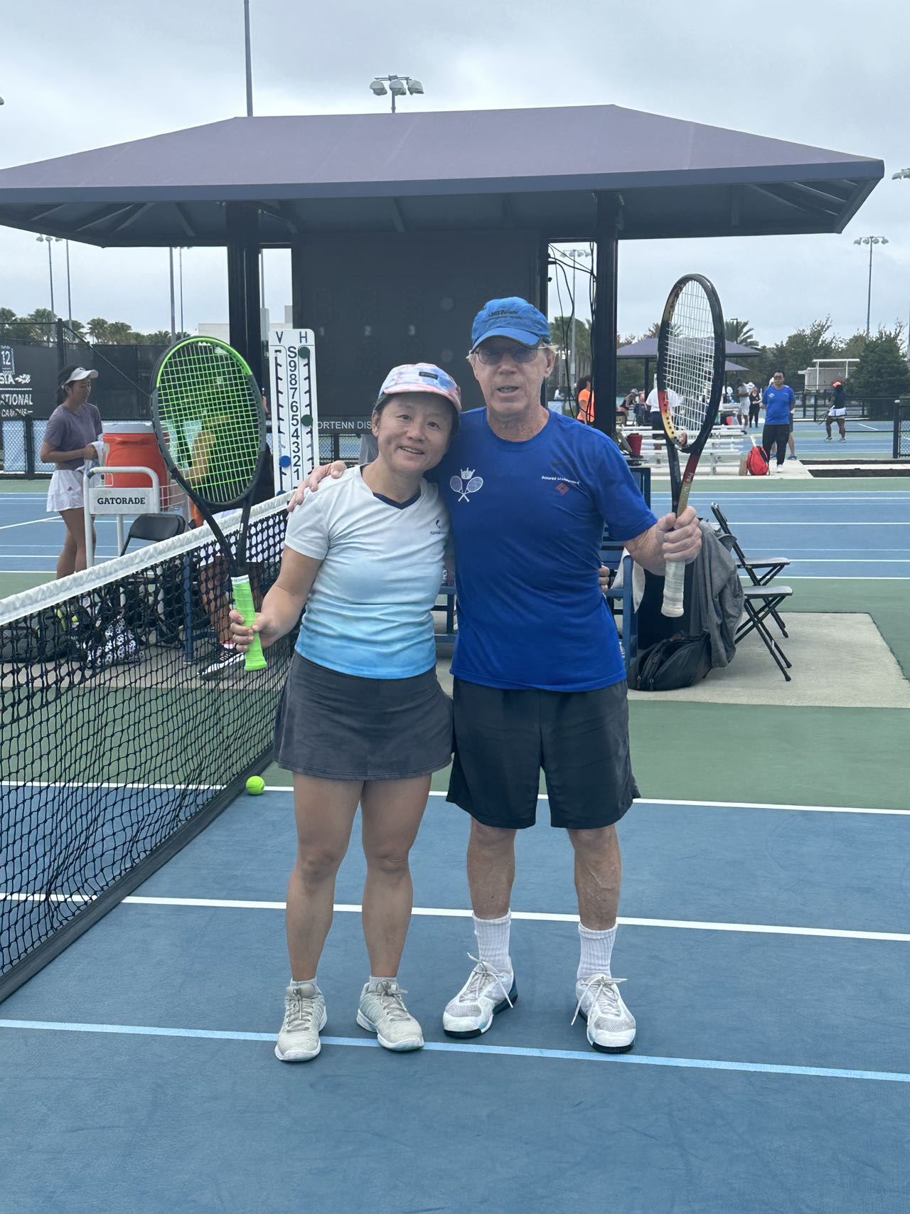 Don and Amy embracing after match